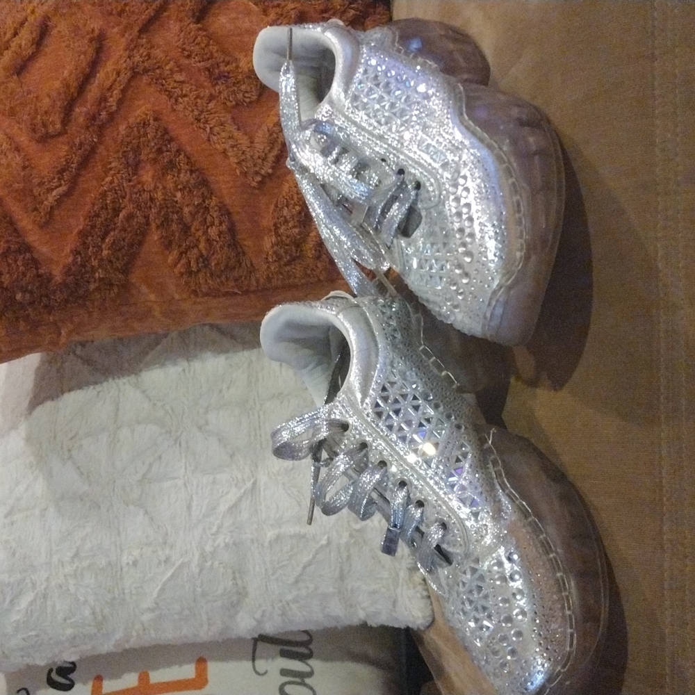Rhinestone studded sneakers.